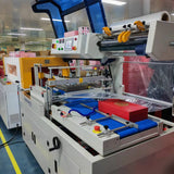 Servo-driven vertical top-and-bottom sealing and shrink packaging machine